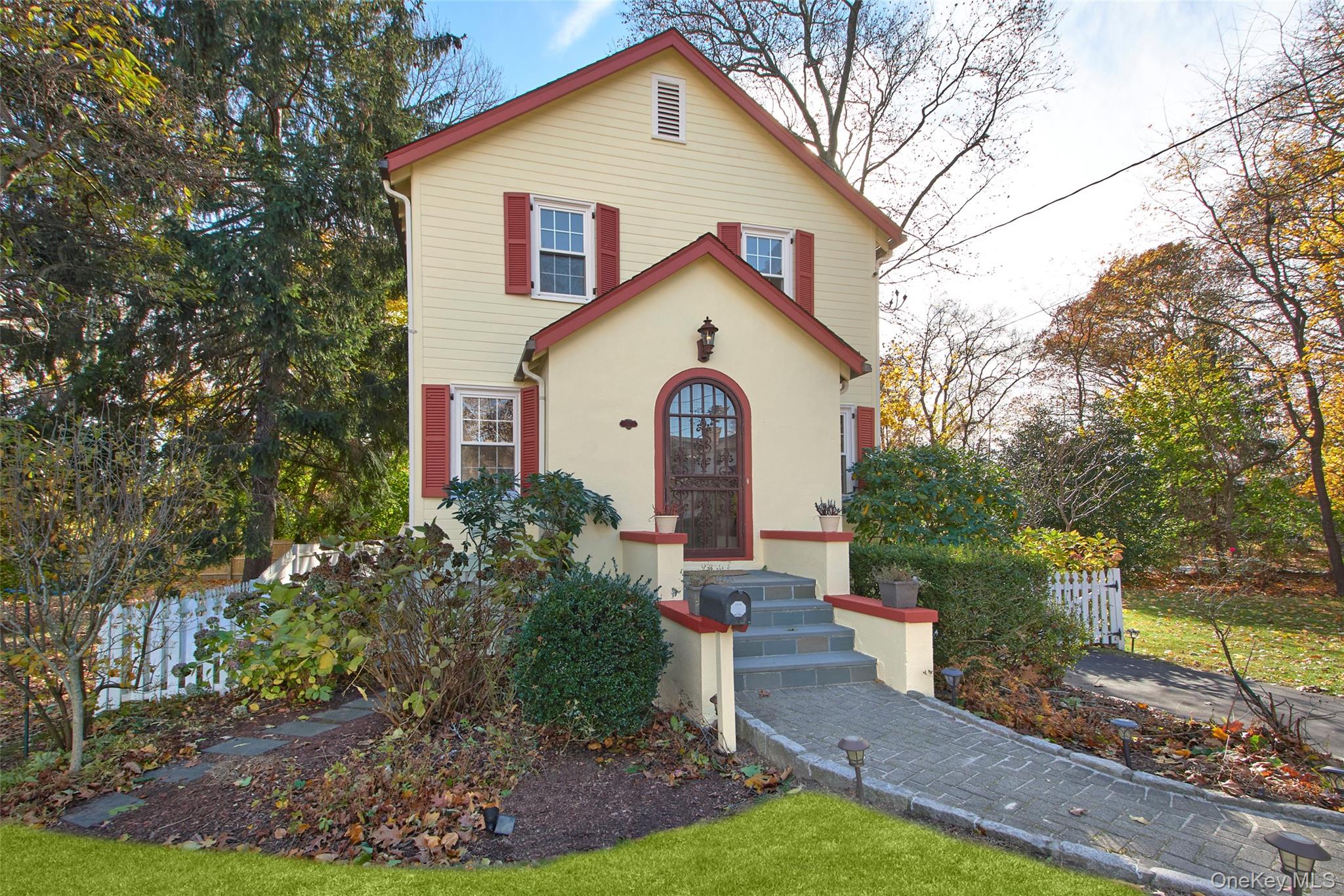 17 Haven Avenue Rye, NY 10580 - Photo 2 of 34 a view of a white house with a yard and potted plants