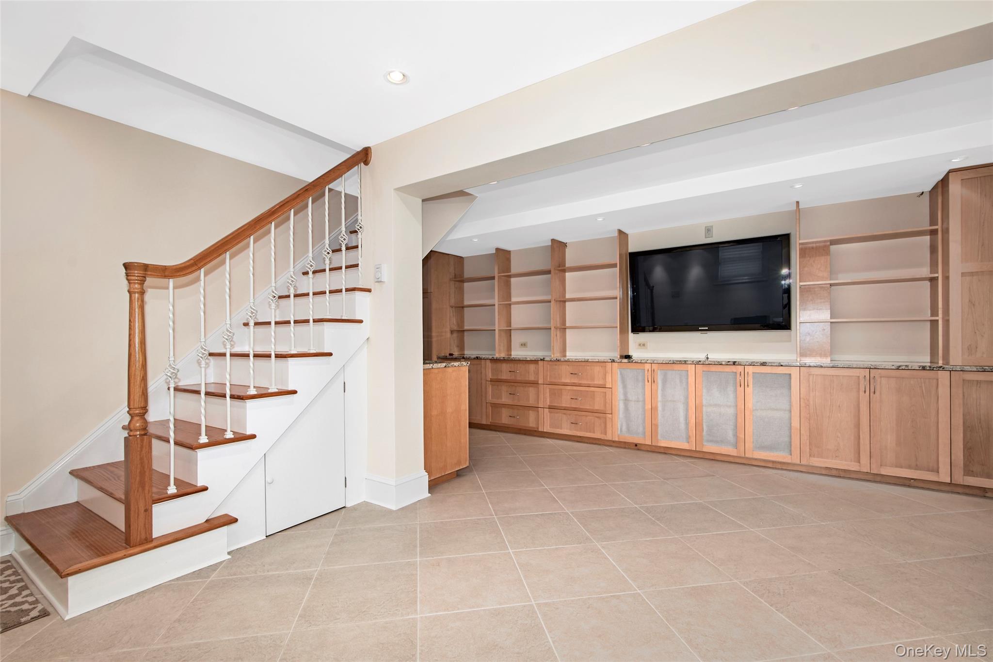 17 Haven Avenue Rye, NY 10580 - Photo 26 of 34 a view of an empty room with wooden floor and windows