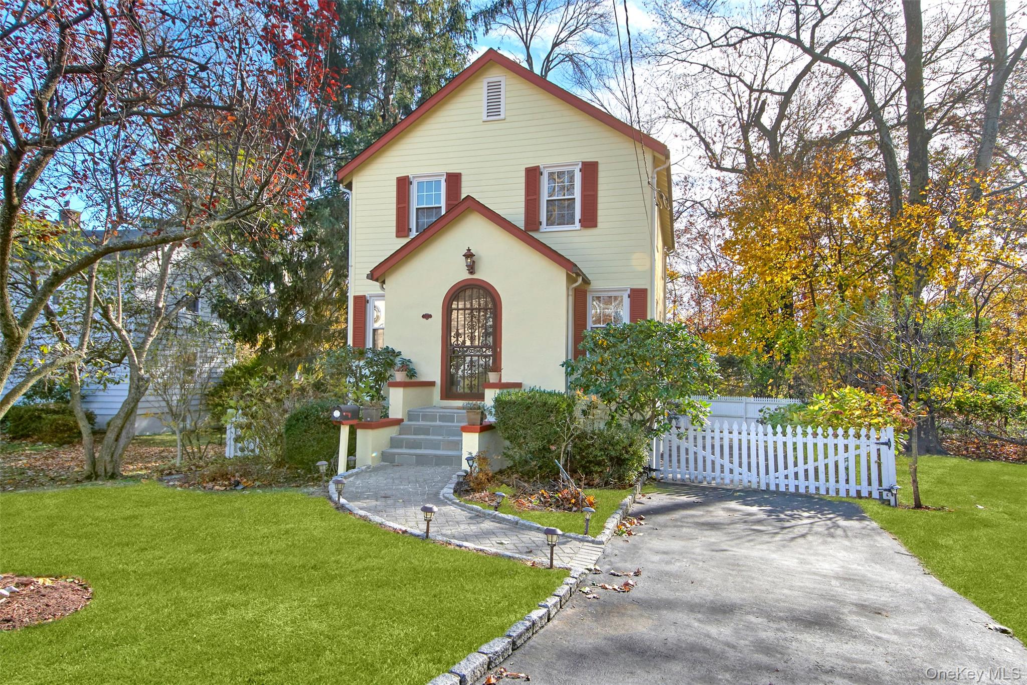 17 Haven Avenue Rye, NY 10580 - Photo 3 of 34 a view of a house with a yard and garden