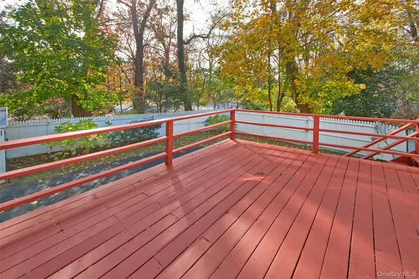 a view of outdoor space with deck and wooden floor