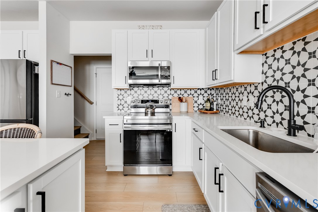 1900 Roseneath Road, Unit 8B Richmond, VA 23230 - Photo 16 of 50 Kitchen with stainless steel appliances and white