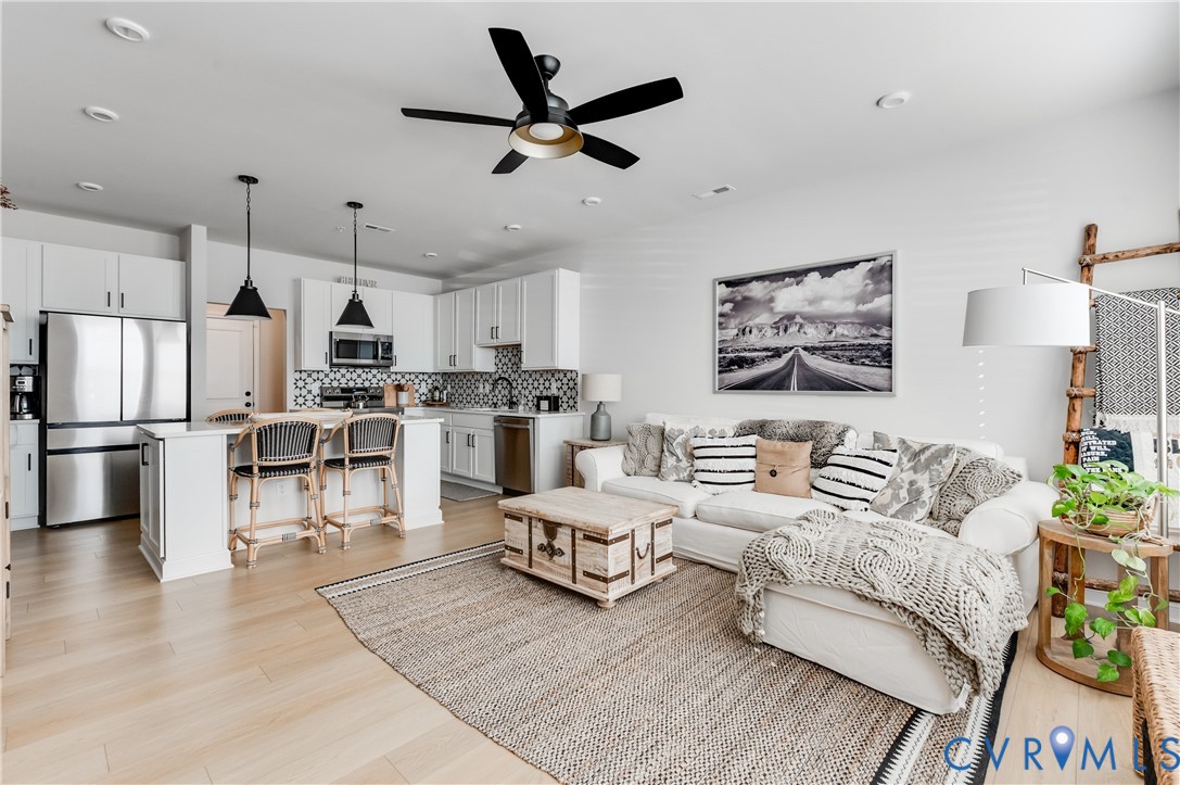 1900 Roseneath Road, Unit 8B Richmond, VA 23230 - Photo 2 of 50 Living area featuring ceiling fan, light wood fini