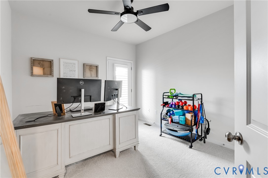 1900 Roseneath Road, Unit 8B Richmond, VA 23230 - Photo 37 of 50 Home office with light carpet and ceiling fan