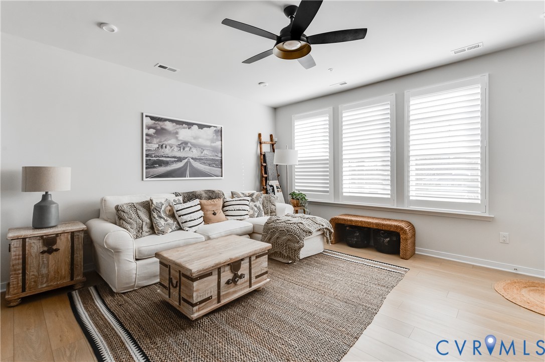 1900 Roseneath Road, Unit 8B Richmond, VA 23230 - Photo 4 of 50 Living room featuring light wood-style flooring an
