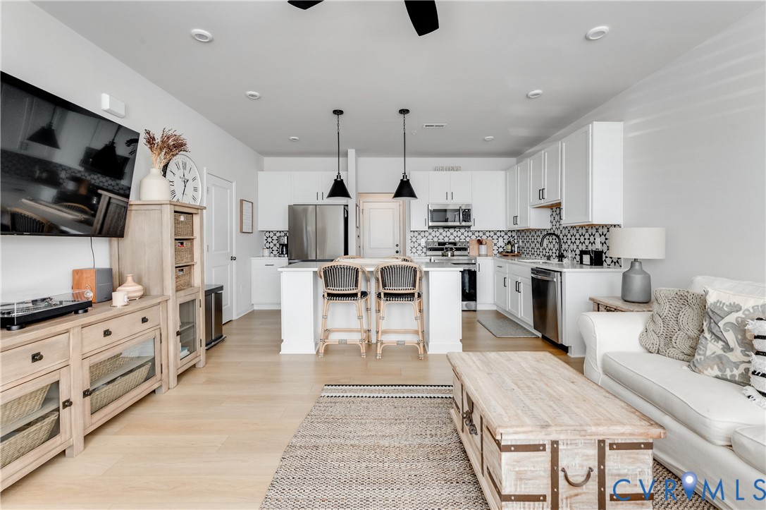 1900 Roseneath Road, Unit 8B Richmond, VA 23230 - Photo 8 of 50 Living room featuring light wood-type flooring and
