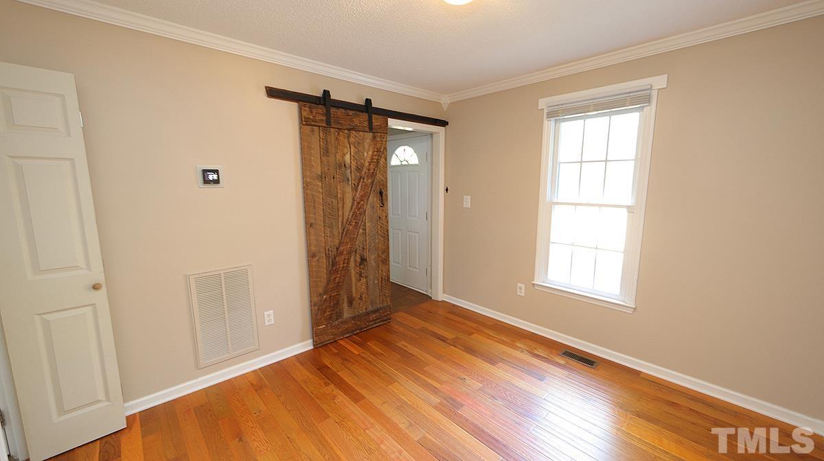 7252 Shawan Road Wendell, NC 27591 - Photo 19 of 20 Real Wooden shutters, new roof, replaced front railing and trim board