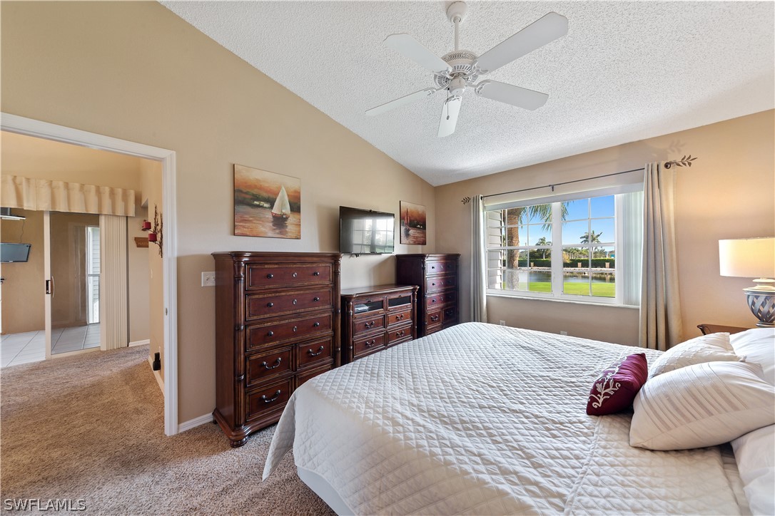 14995 Rivers Edge Court, Unit 250 Fort Myers, FL 33908 - Photo 11 of 19 a bedroom with a bed and dresser
