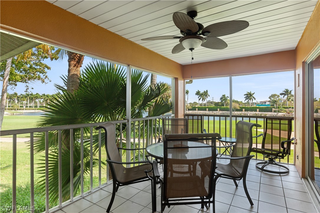 14995 Rivers Edge Court, Unit 250 Fort Myers, FL 33908 - Photo 5 of 19 a view of a chairs and table in patio