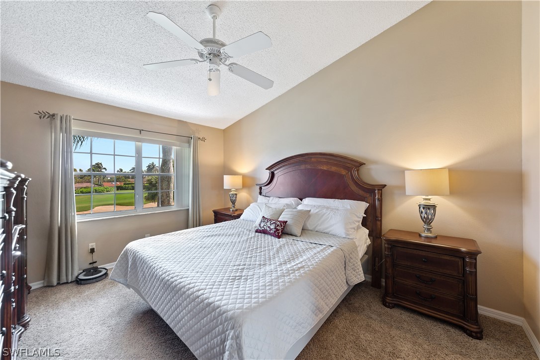 14995 Rivers Edge Court, Unit 250 Fort Myers, FL 33908 - Photo 10 of 19 a bedroom with a bed and a window