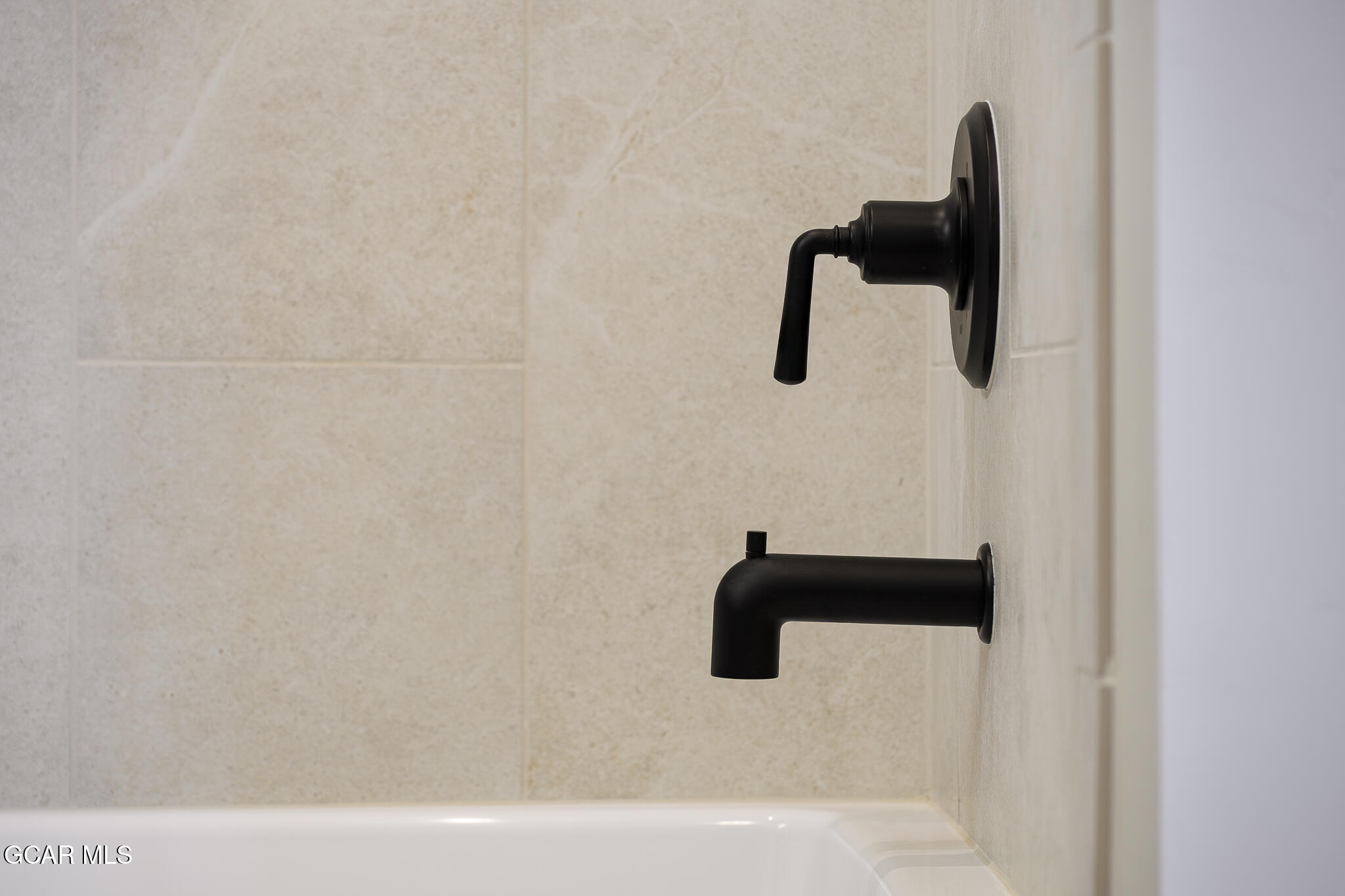 72 Meadow Trail, Unit F101 Fraser, CO 80442 - Photo 13 of 19 a bathroom with a shower