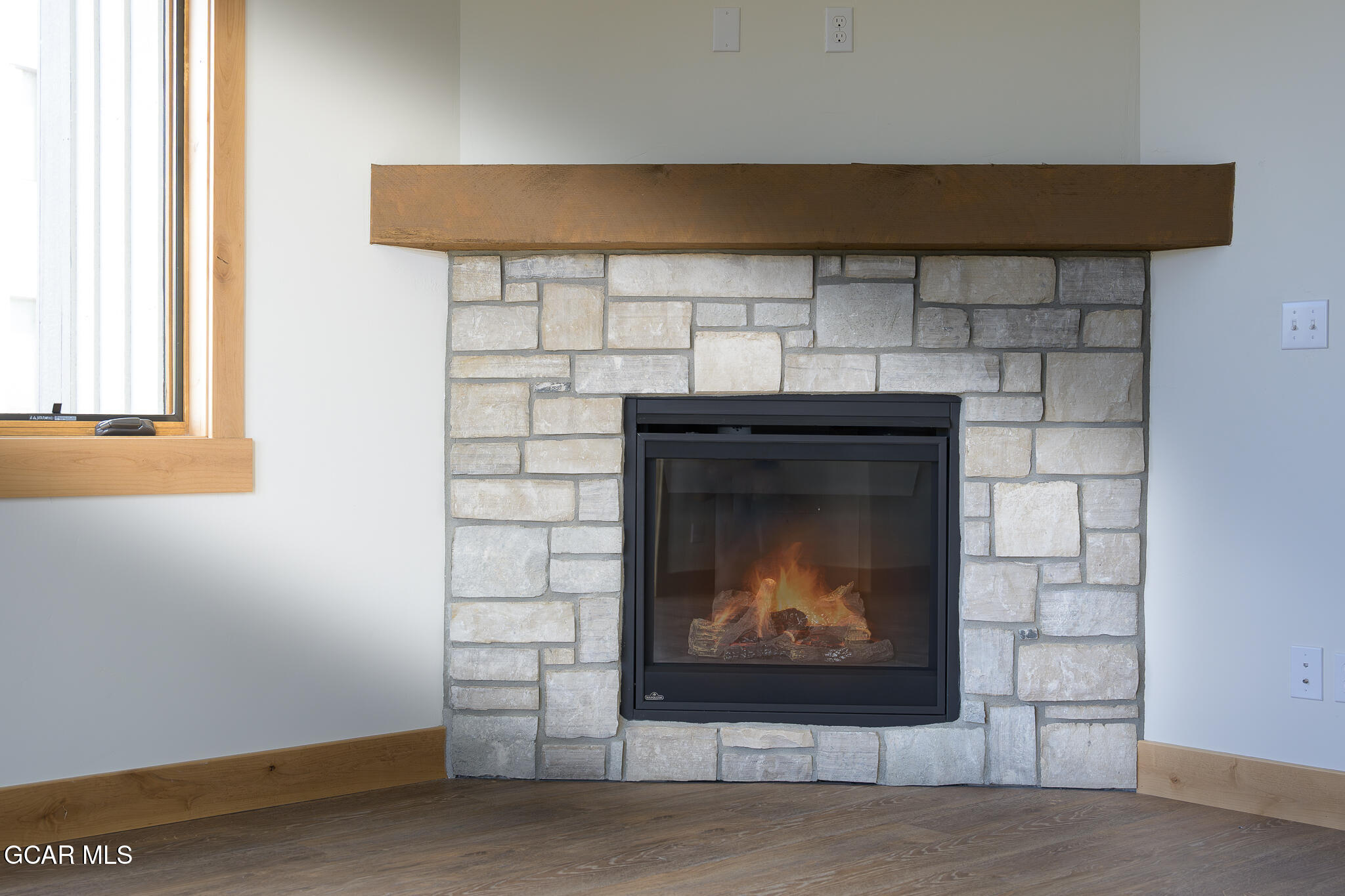 72 Meadow Trail, Unit F101 Fraser, CO 80442 - Photo 16 of 19 a room with fireplace