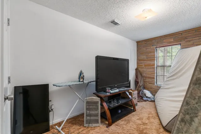 a kitchen with counter top space and cabinets