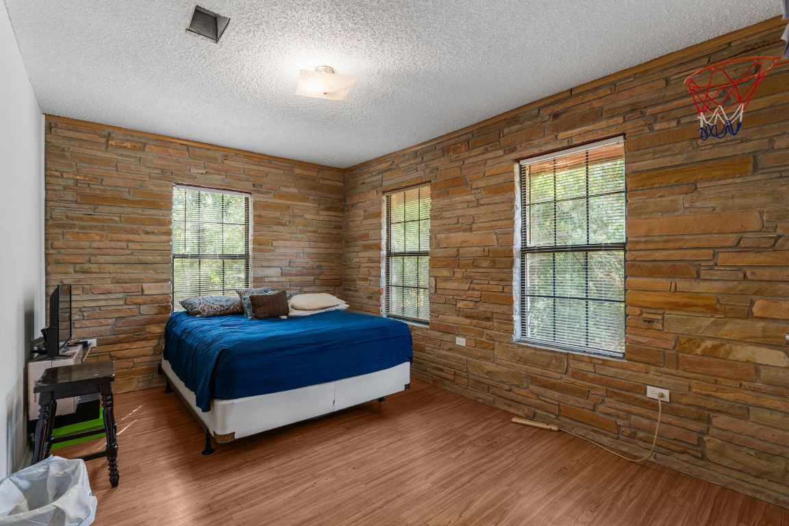 950 County Road 481 Thrall, TX 76578 - Photo 12 of 25 a living room with a bed furniture and a window