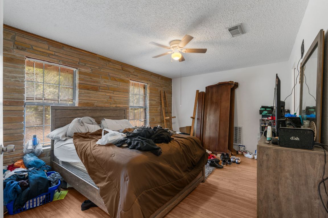 950 County Road 481 Thrall, TX 76578 - Photo 14 of 25 a bed room with a bed and a television