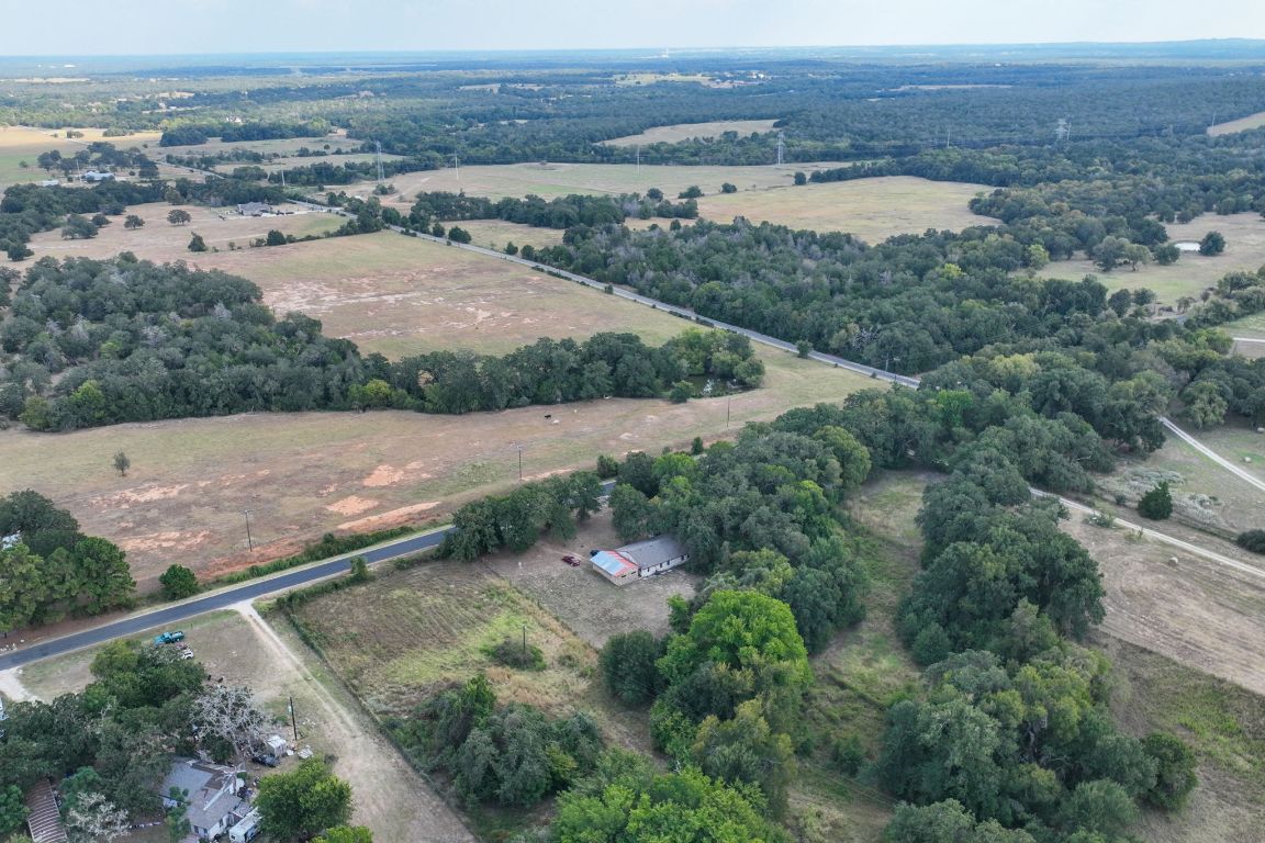 950 County Road 481 Thrall, TX 76578 - Photo 22 of 25 an aerial view of residential houses with outdoor space and trees