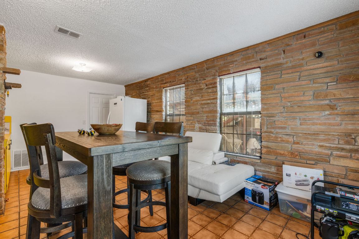 950 County Road 481 Thrall, TX 76578 - Photo 7 of 25 a workspace with furniture and window