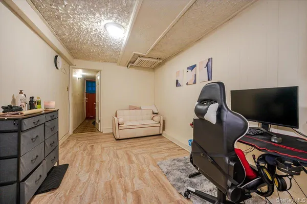 a kitchen with stainless steel appliances granite countertop a sink dishwasher and cabinets with wooden floor