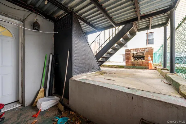 a front view of a building with garden