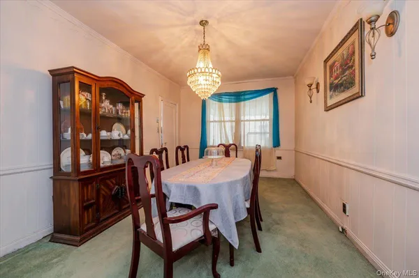 a kitchen with stainless steel appliances granite countertop a sink and dishwasher a refrigerator with wooden cabinets