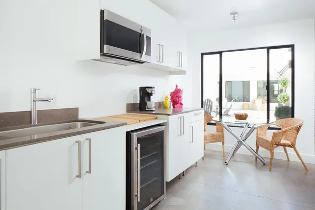 a view of a swimming pool with a patio