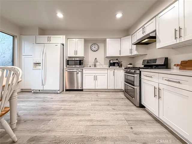 a house with trees in front of it