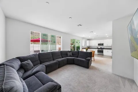 a bed room with a bed and a couch