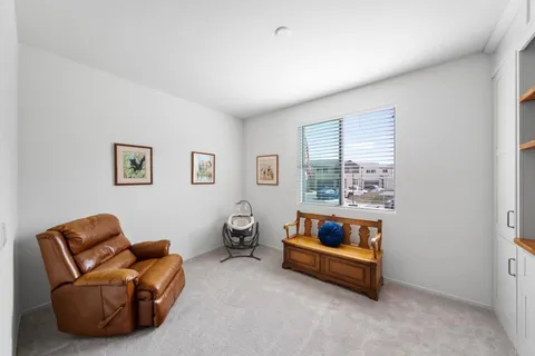 a bathroom with a sink toilet and mirror