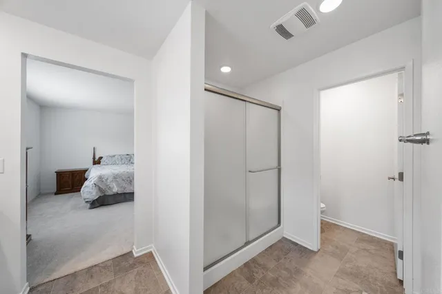 a view of a house with backyard sitting area and garden