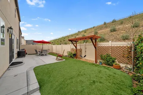 a street sign that is on a brick wall