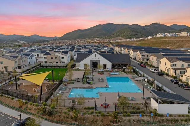a view of a house with a street