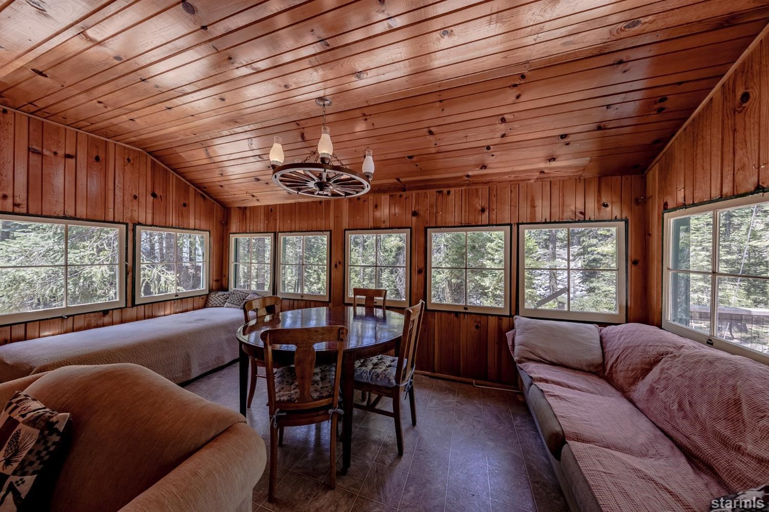 9 42 Milestone Trail Twin Bridges, CA 95735 - Photo 12 of 15 a view of a dining room with furniture window and outside view