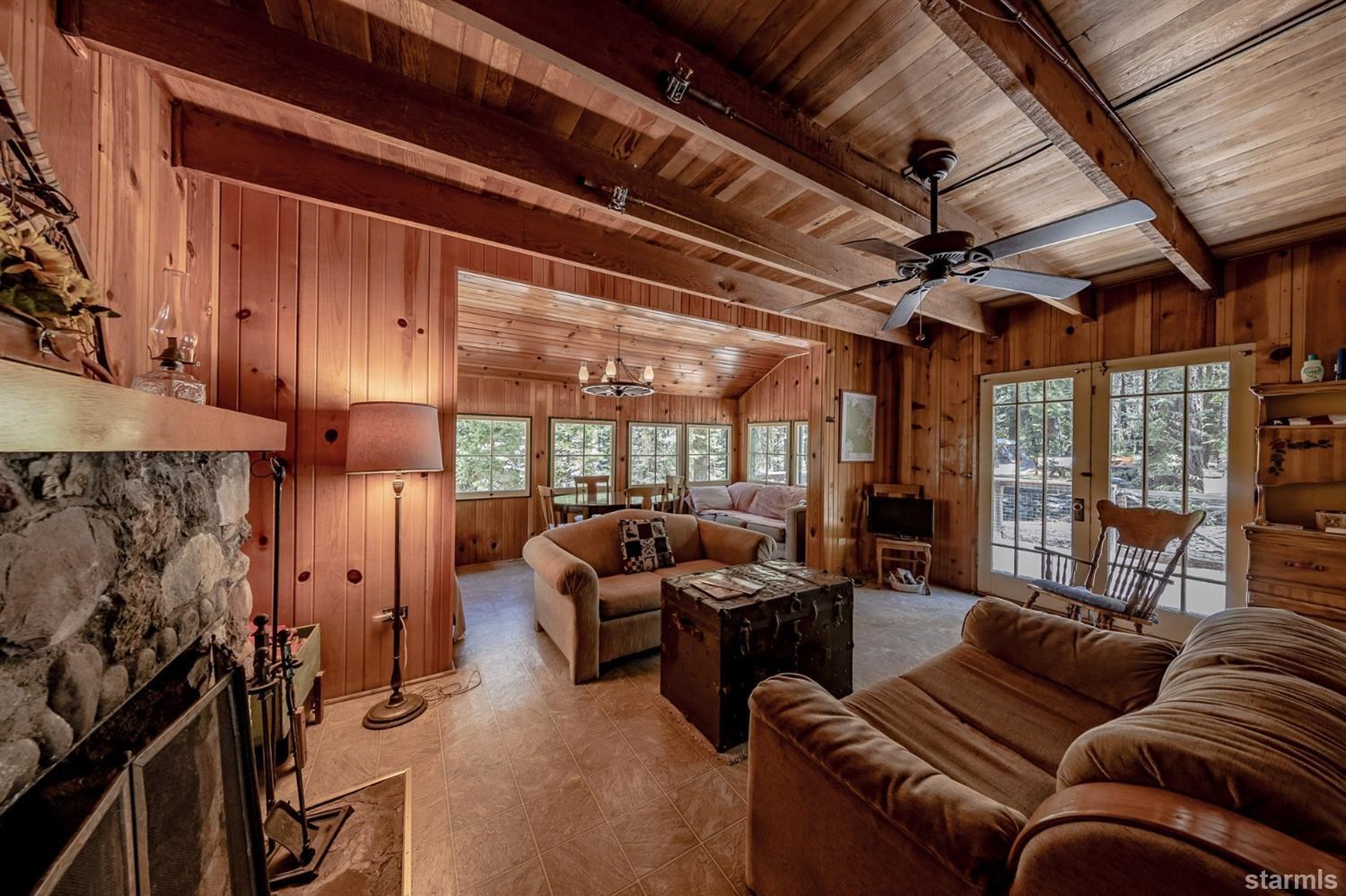 9 42 Milestone Trail Twin Bridges, CA 95735 - Photo 10 of 15 a living room with furniture and a large window