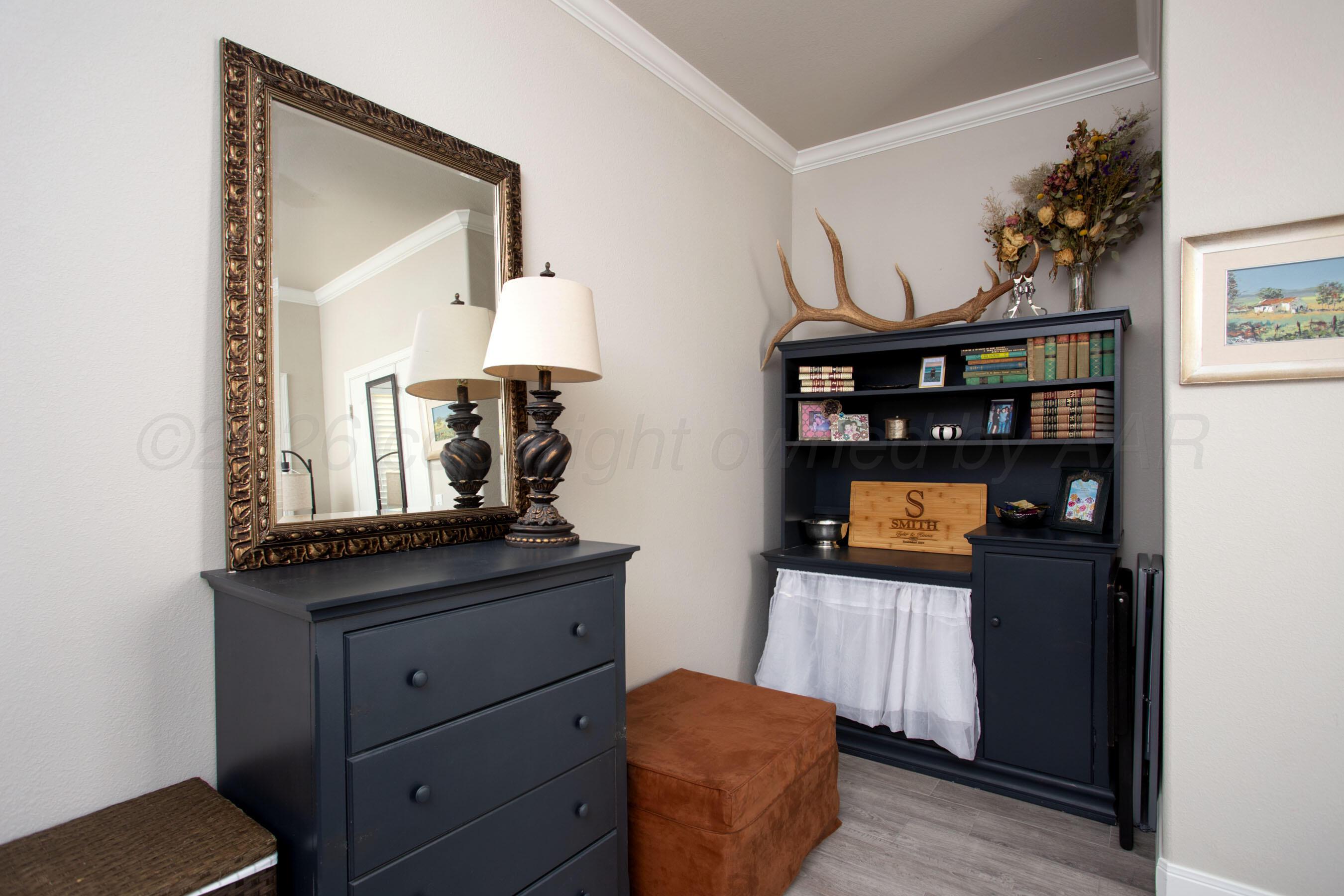 57 Cm Lane Canyon, TX 79015 - Photo 16 of 26 a bedroom with a bed and a dresser in it