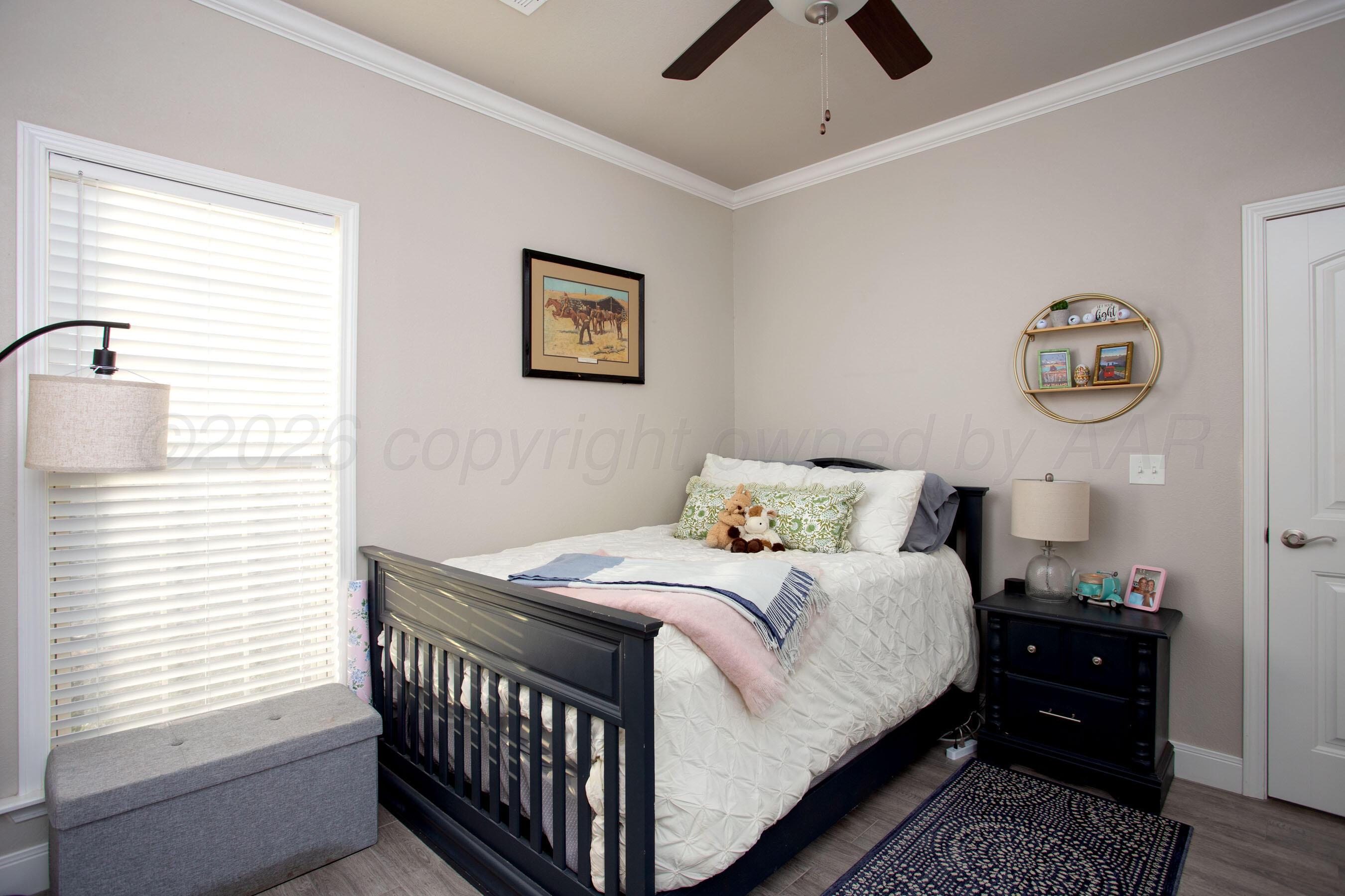 57 Cm Lane Canyon, TX 79015 - Photo 17 of 26 a bedroom with a bed and a window