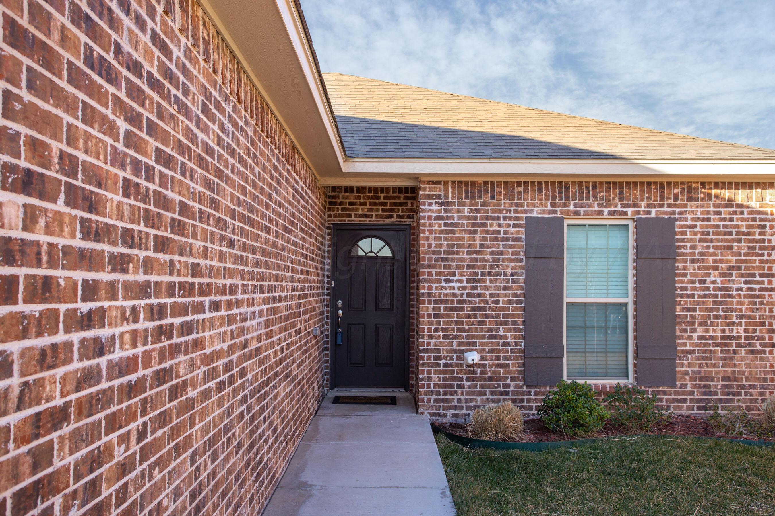 57 Cm Lane Canyon, TX 79015 - Photo 3 of 26 a view of a brick house with a large window