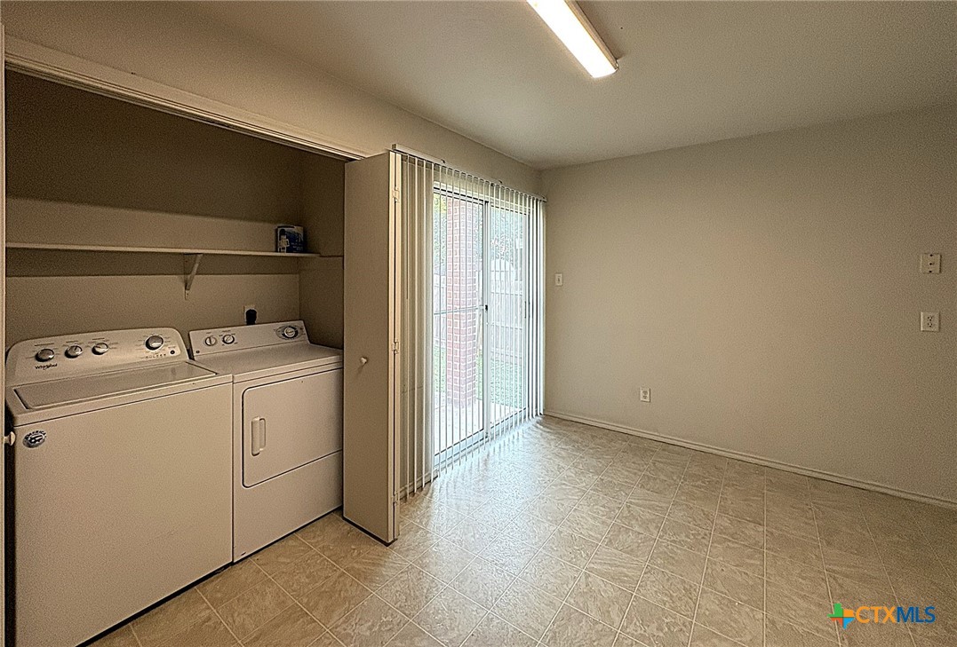 1611 Inca Drive, Unit D Harker Heights, TX 76548 - Photo 5 of 9 a view of storage and utility room with washer and dryer
