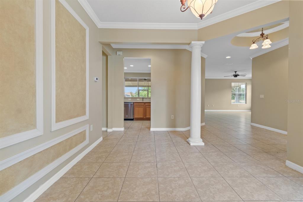 8251 Southwest 84th Place Road Ocala, FL 34481 - Photo 4 of 38 a view of livingroom with kitchen