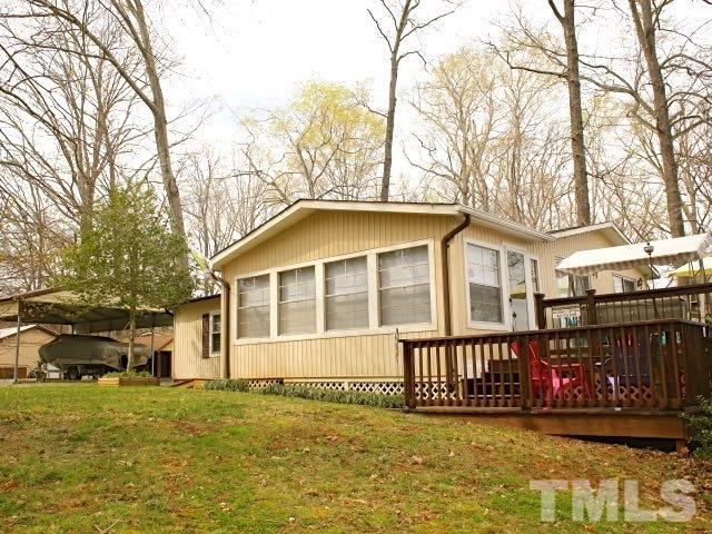 9566 George Ruff Road Bullock, NC 27507 - Photo 14 of 25 a view of a house with a yard