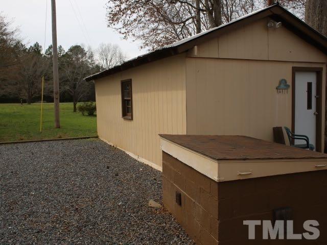 9566 George Ruff Road Bullock, NC 27507 - Photo 15 of 25 a backyard of a house