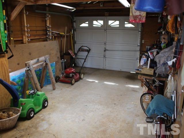 9566 George Ruff Road Bullock, NC 27507 - Photo 16 of 25 a view of a room with gym equipment