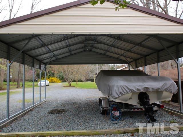 9566 George Ruff Road Bullock, NC 27507 - Photo 20 of 25 a view of a porch with furniture
