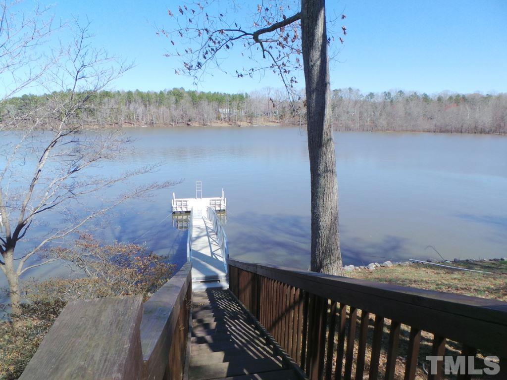 9566 George Ruff Road Bullock, NC 27507 - Photo 21 of 25 a view of a lake from a balcony