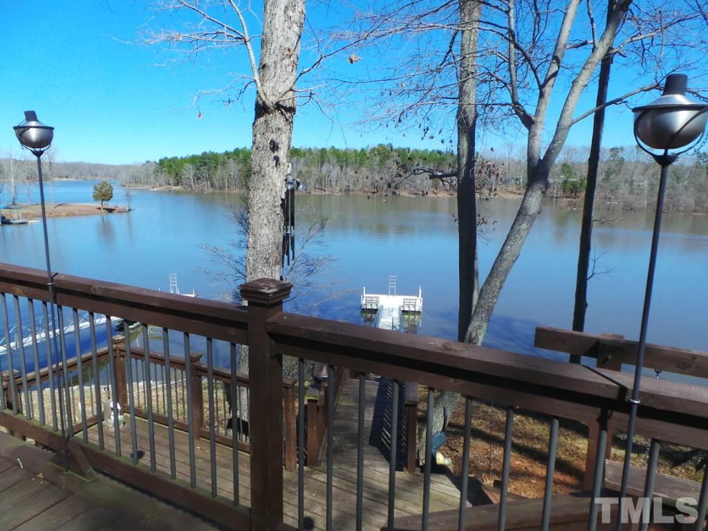 9566 George Ruff Road Bullock, NC 27507 - Photo 22 of 25 a view of a balcony with lake view