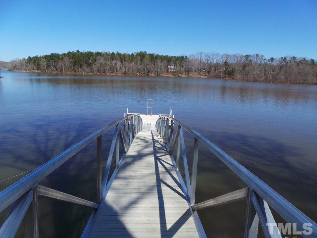 9566 George Ruff Road Bullock, NC 27507 - Photo 23 of 25 a view of a lake from a balcony