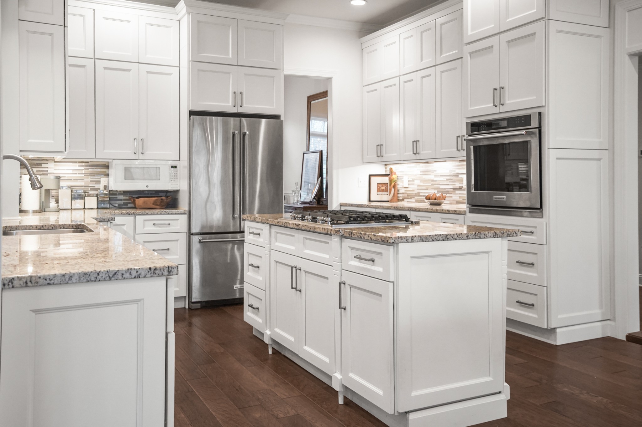 2003 Tammy Drive Springfield, TN 37172 - Photo 39 of 69 a kitchen with granite countertop white cabinets and stainless steel appliances