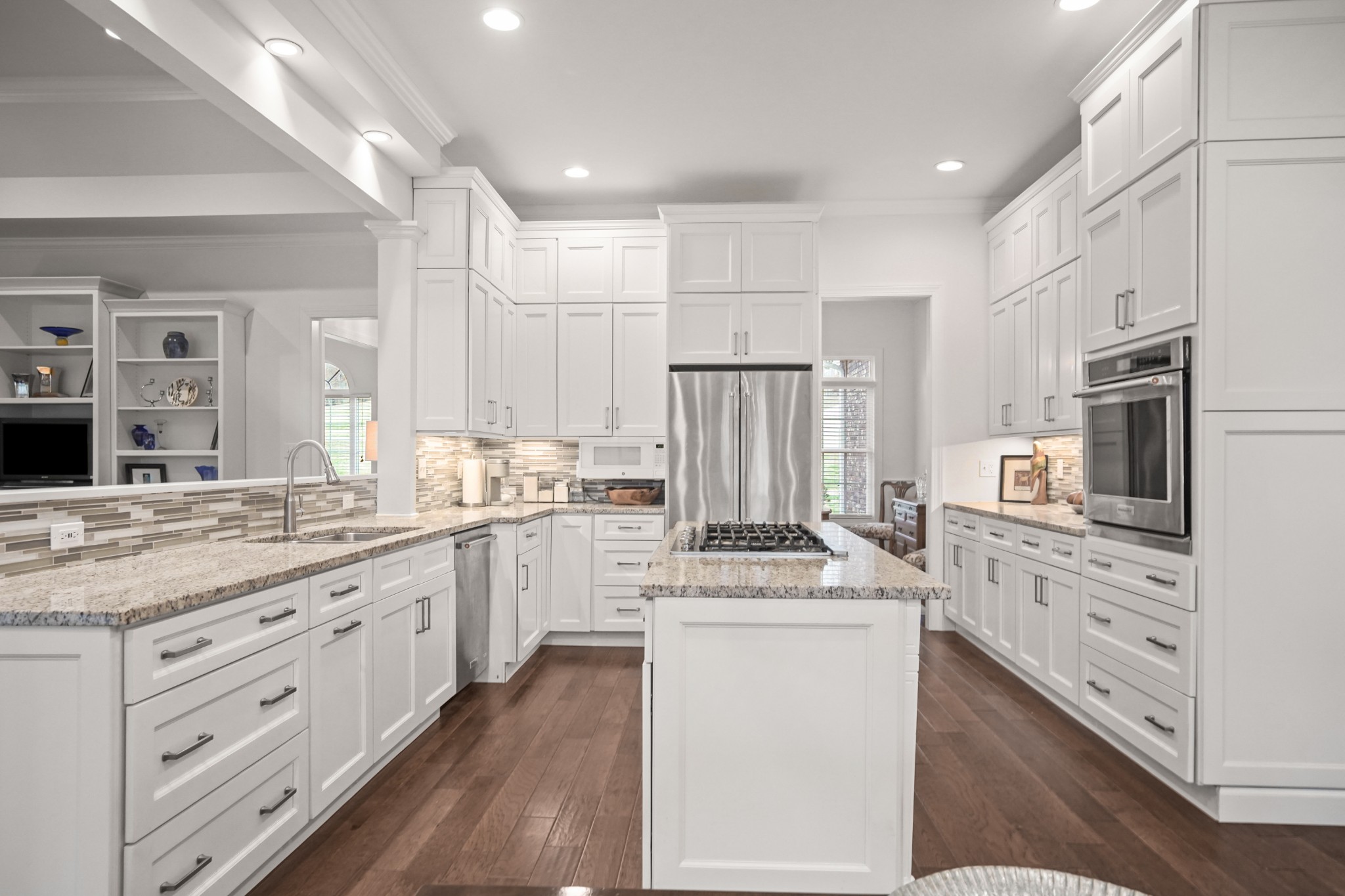 2003 Tammy Drive Springfield, TN 37172 - Photo 40 of 69 a kitchen with kitchen island white cabinets white stainless steel appliances and sink