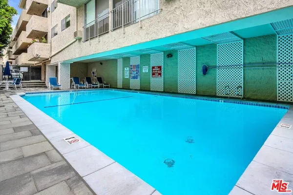 a view of an swimming pool with an outdoor space