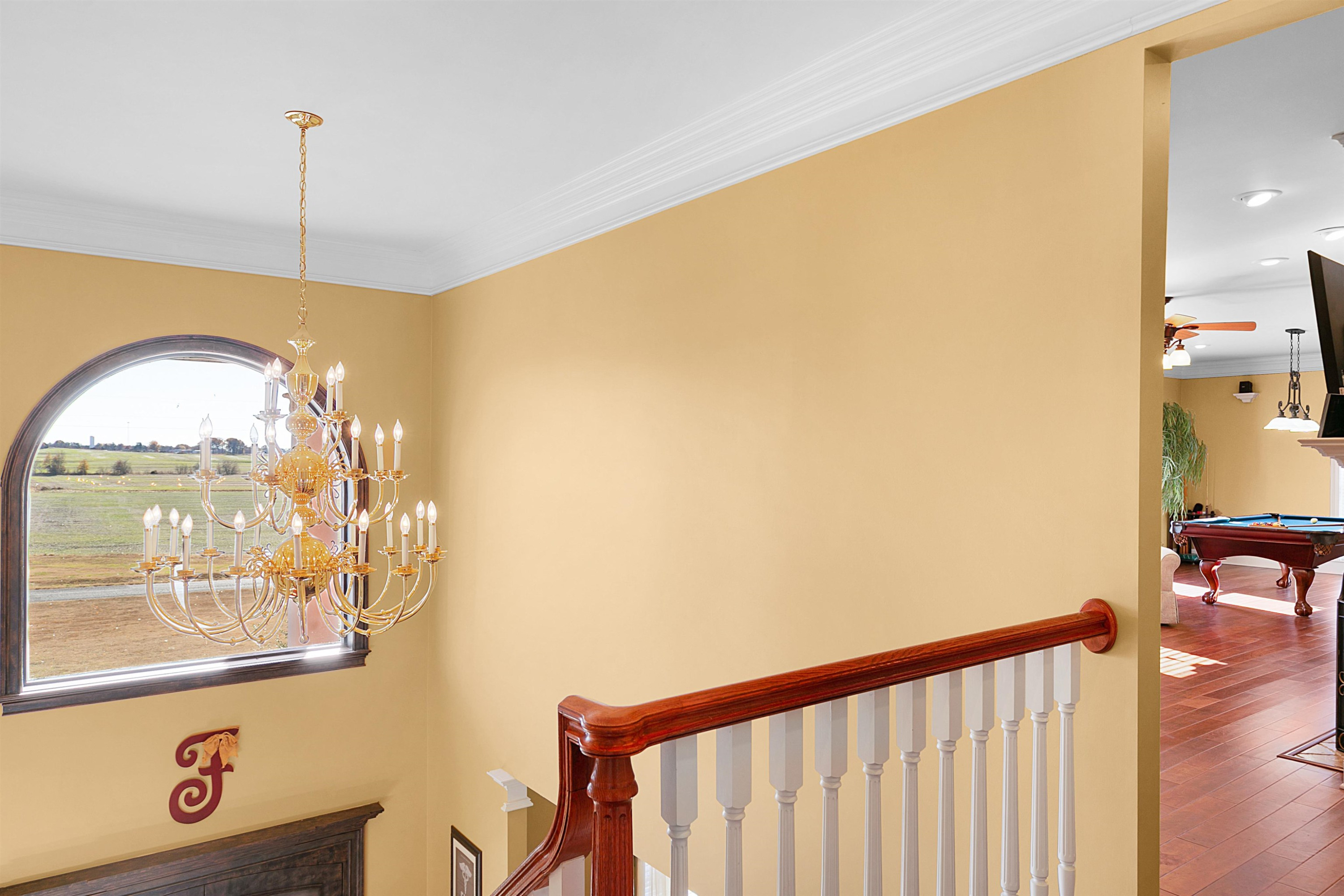 189 Rust Road Bells, TN 38006 - Photo 18 of 33 a view of a hallway with a chandelier