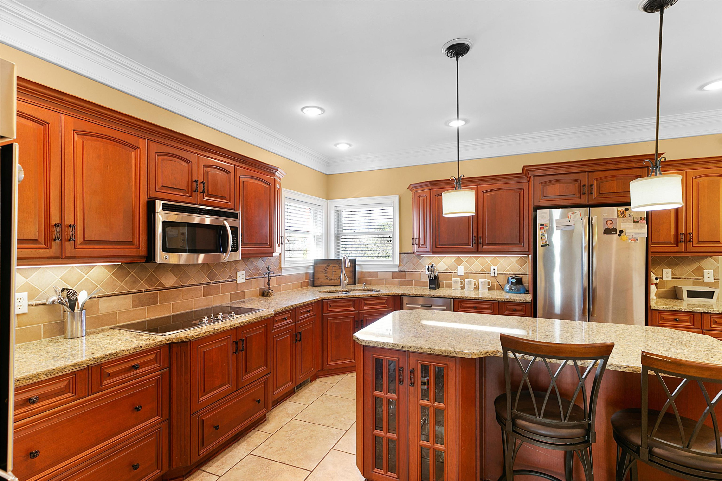 189 Rust Road Bells, TN 38006 - Photo 9 of 33 a kitchen with a sink table and chairs