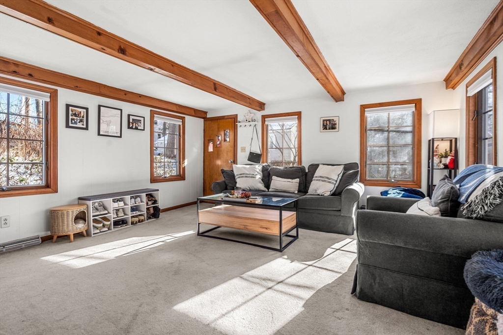 11 Cogswell Road North Reading, MA 01864 - Photo 26 of 29 a living room with furniture and windows
